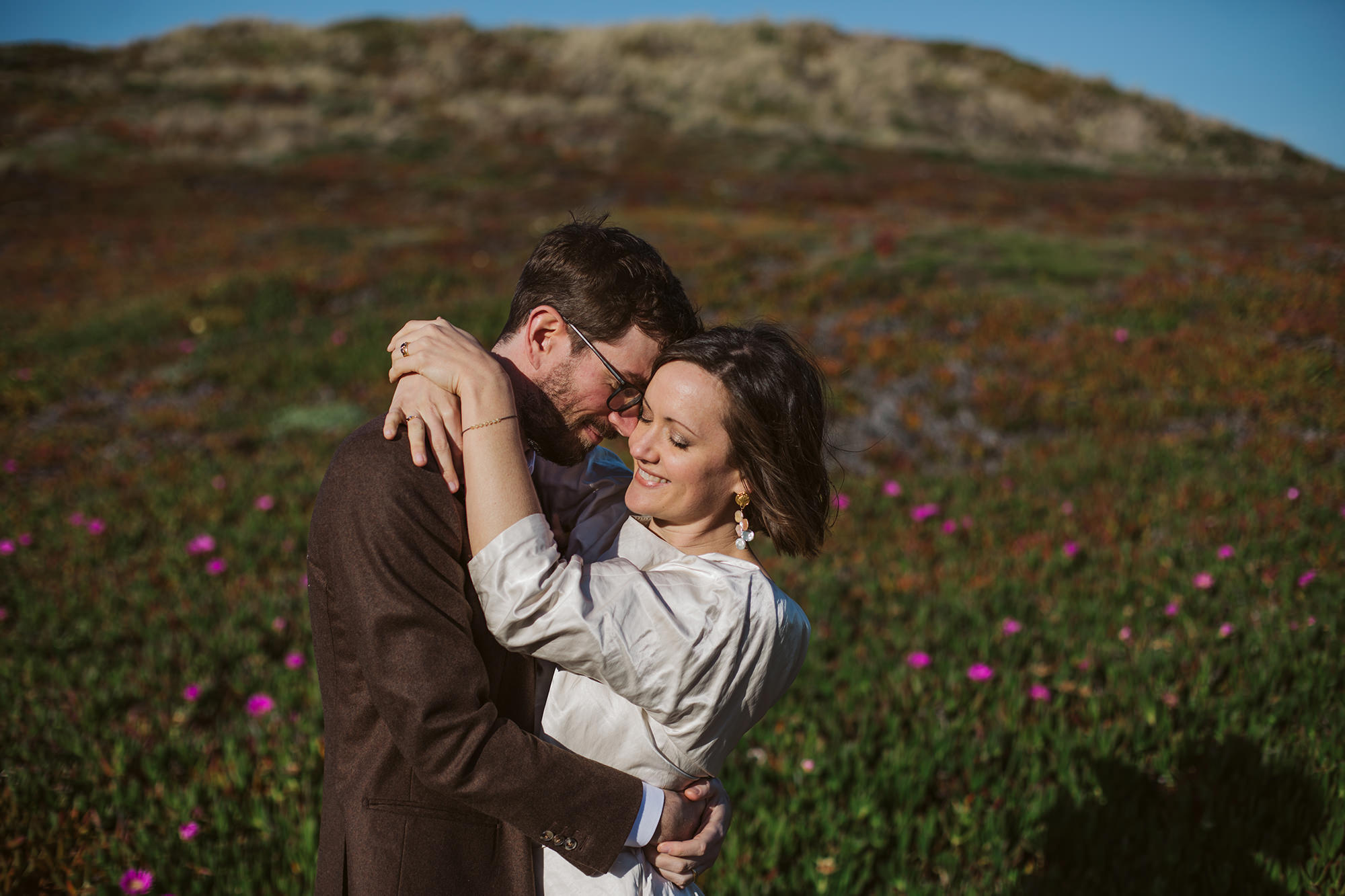 Groom hugs bride for for Point Reyes Elopement.