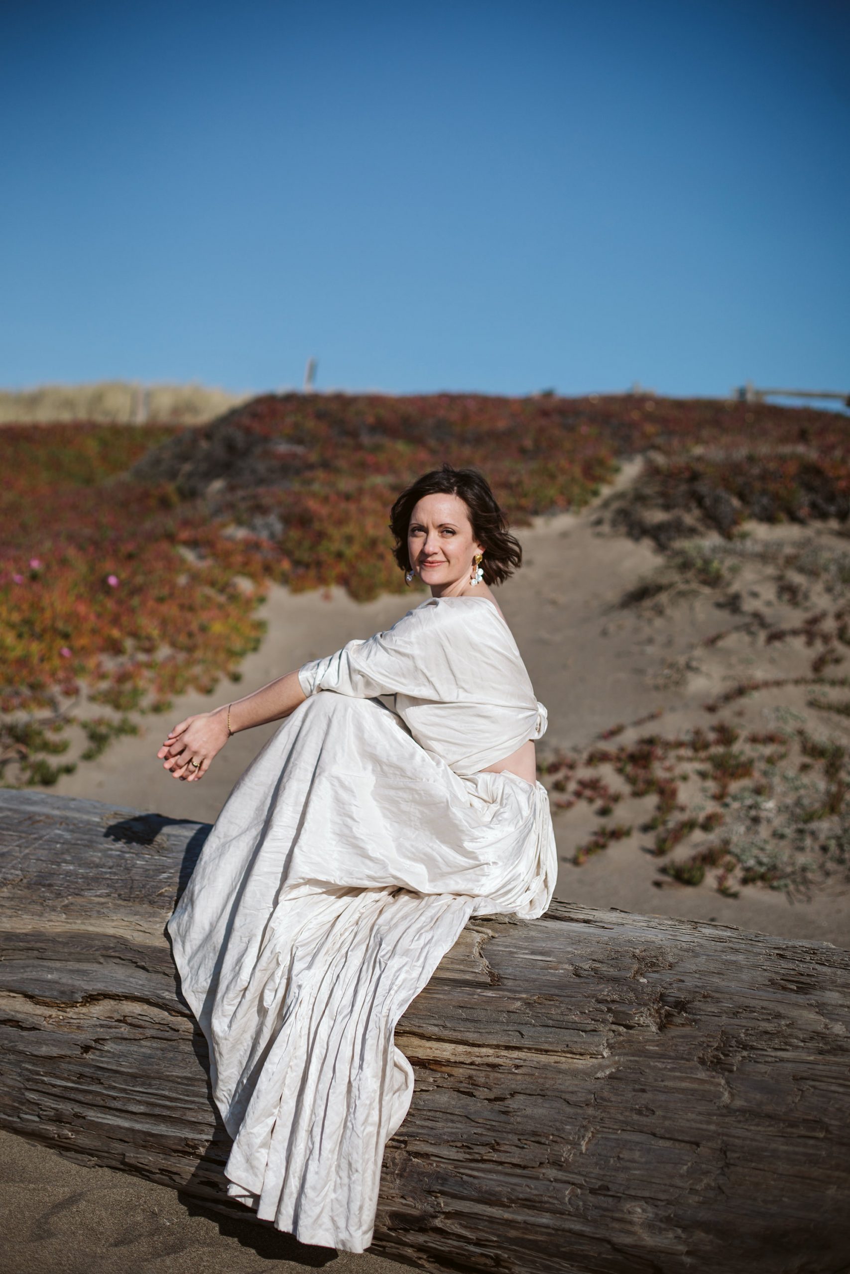 Bride on beach during Point Reyes Elopement