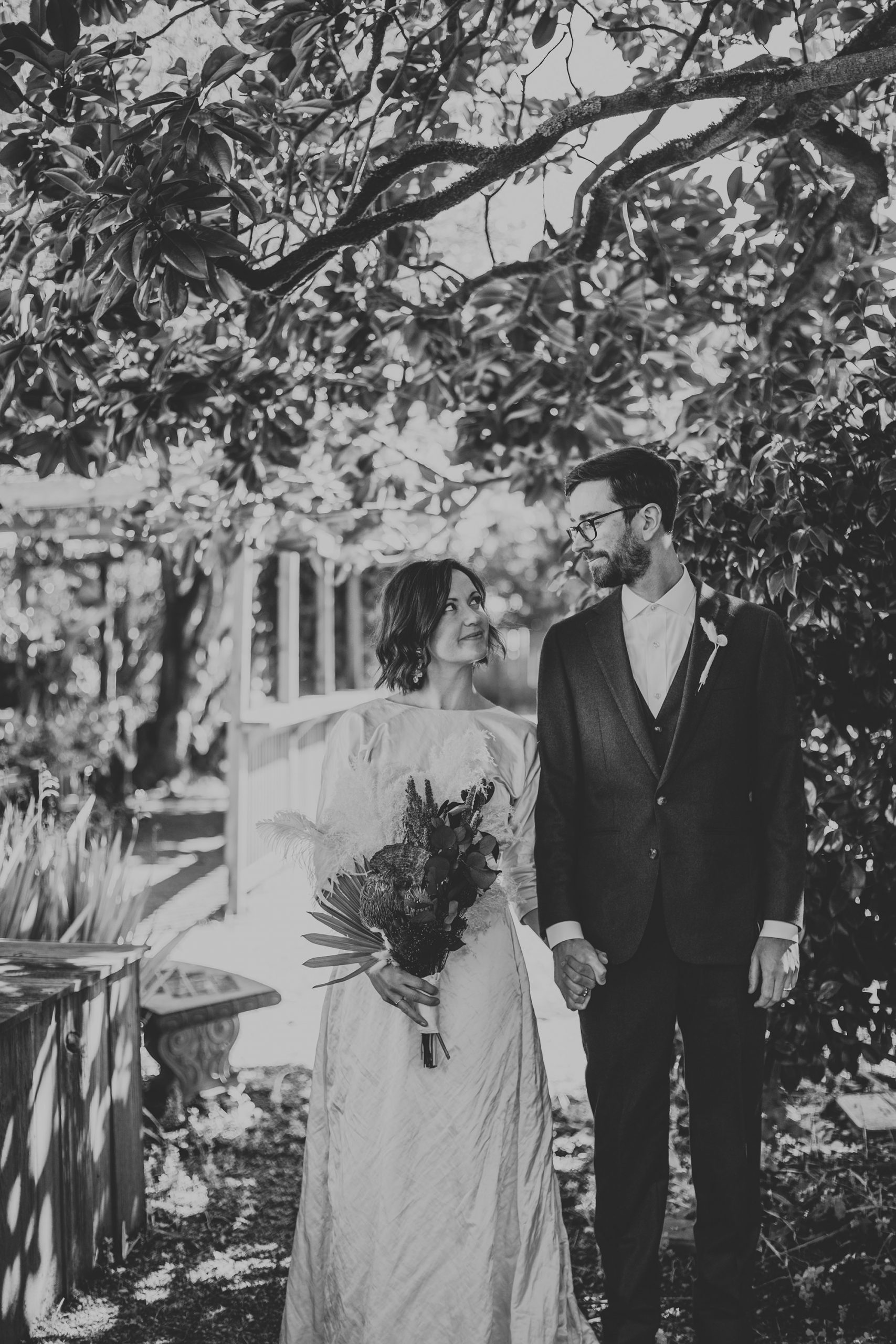 Bride and groom kiss at Olema House for Point Reyes elopement