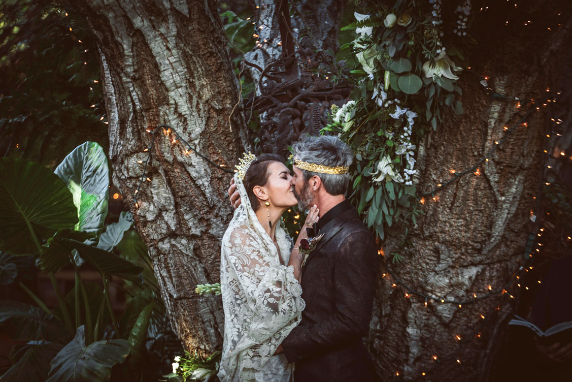 Bride and groom say I do and kiss at Game of Thrones themed wedding.