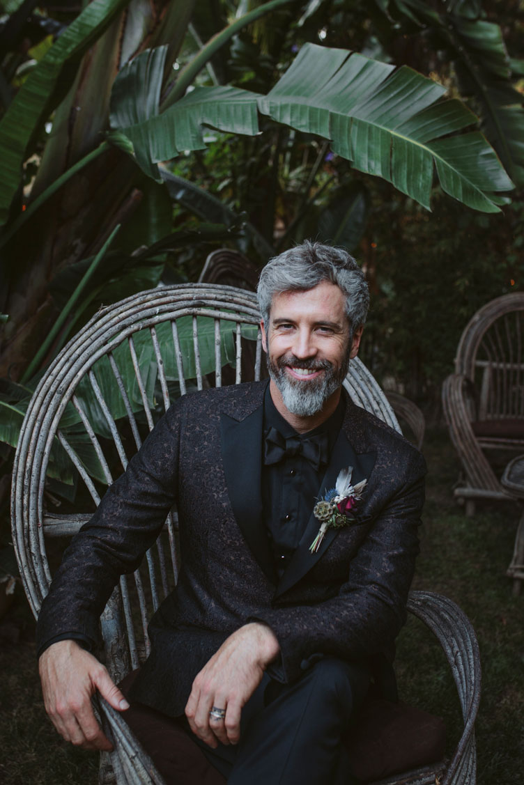 Regal portrait of smiling groom at a Carmel wedding by Becca Henry Photography