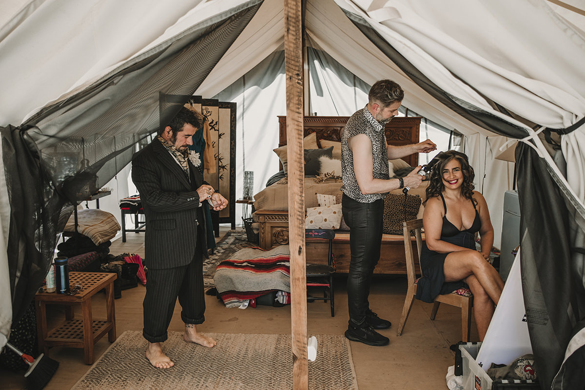 camping wedding bride and groom getting ready together at a camping weekend wedding