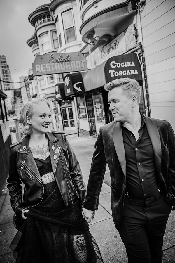 BW image of couple holding hands in north beach , san francisco elopement