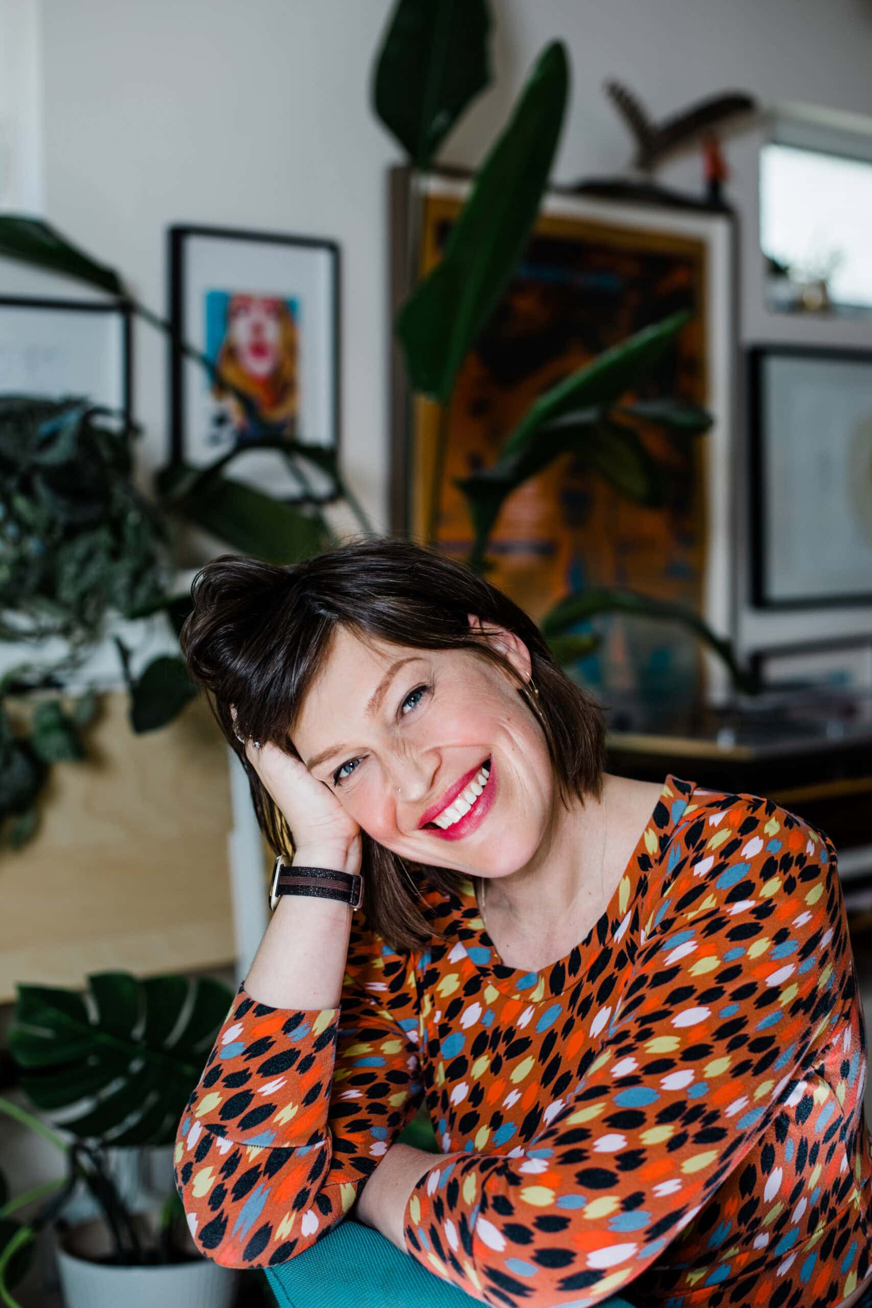 Pilates instructor's high kick in front of wall-Oakland Branding Photography for her new website