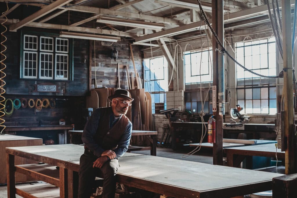 Creative workspace with woodworking tools and natural light.