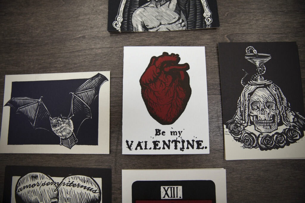 Unique and artistic Valentine’s cards featuring bats, hearts, and skull motifs for San Francisco Center for the Art Branding Photography